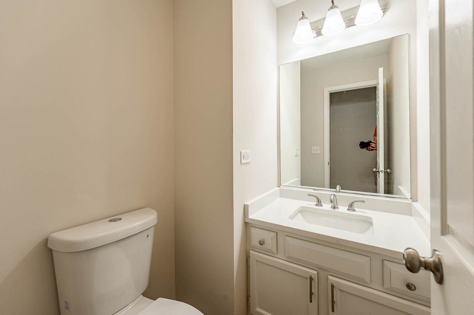 143 Hampton Street Cary, IL 60013 - Photo 12 of 19 a bathroom with a sink toilet and mirror