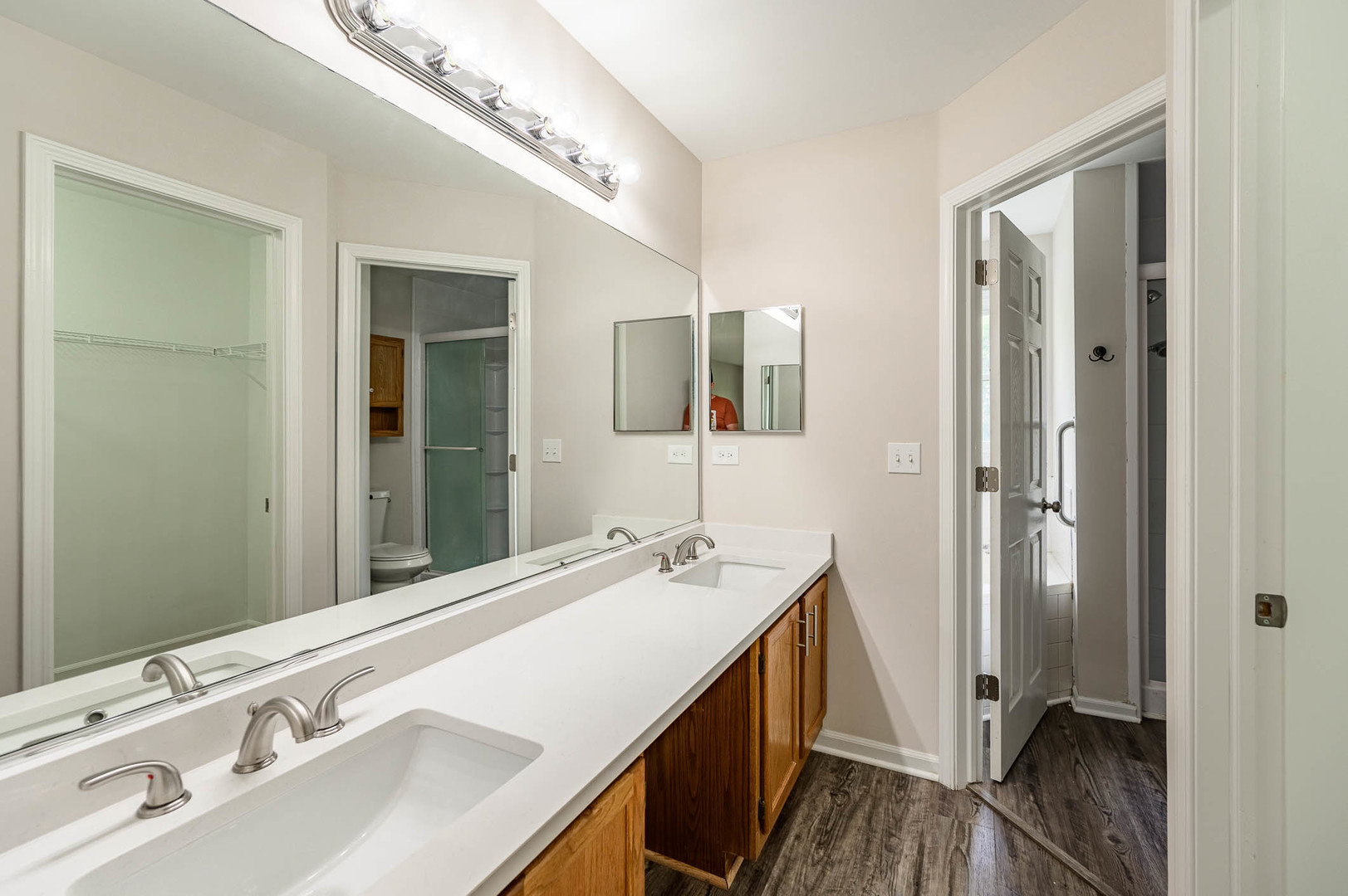 143 Hampton Street Cary, IL 60013 - Photo 16 of 19 a bathroom with a double vanity sink and mirror