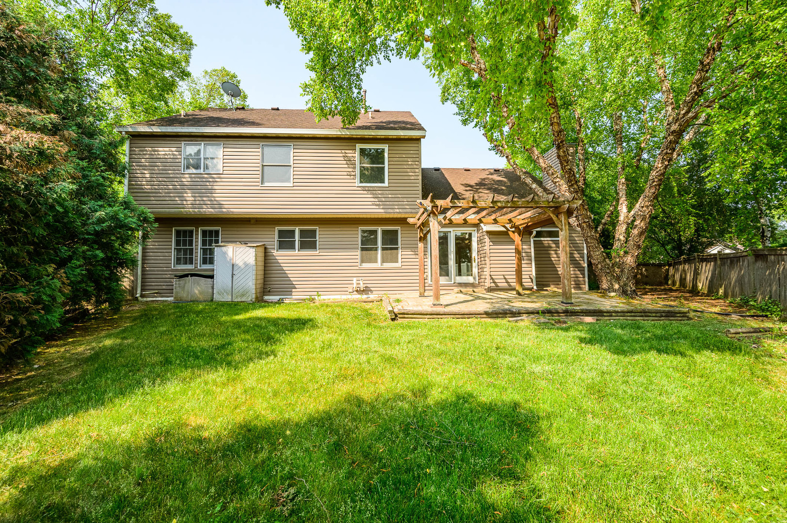 143 Hampton Street Cary, IL 60013 - Photo 19 of 19 a view of a house with pool and a yard