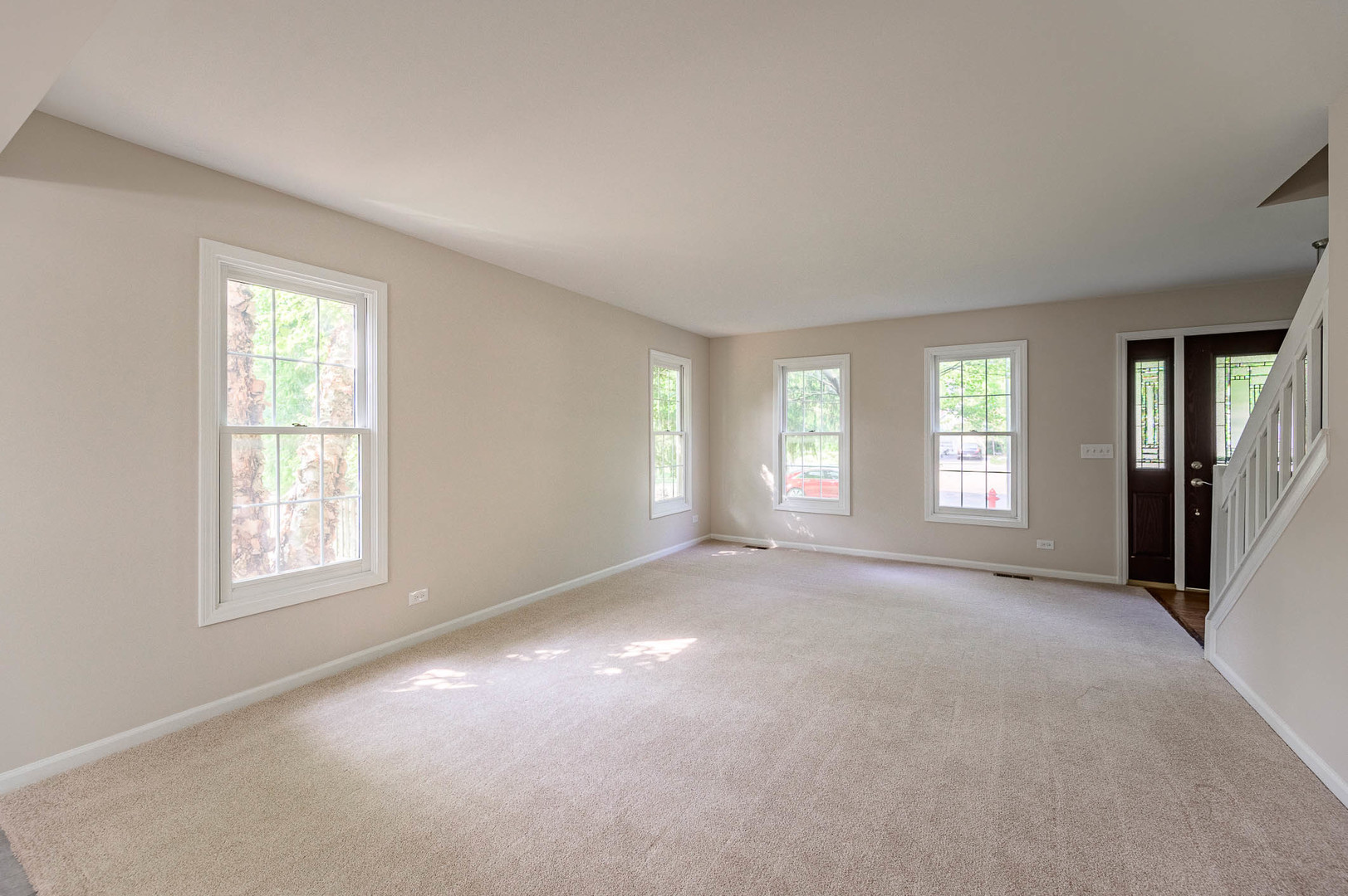 143 Hampton Street Cary, IL 60013 - Photo 2 of 19 an empty room with windows