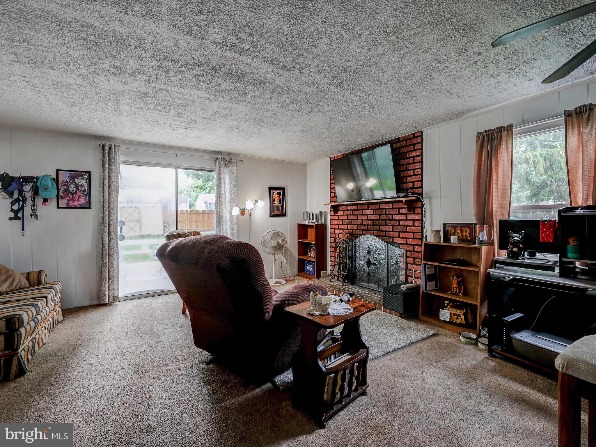 358 Laburnum Road Edgewood, MD 21040 - Photo 29 of 41 Lower level with wood burning fire place & walkout