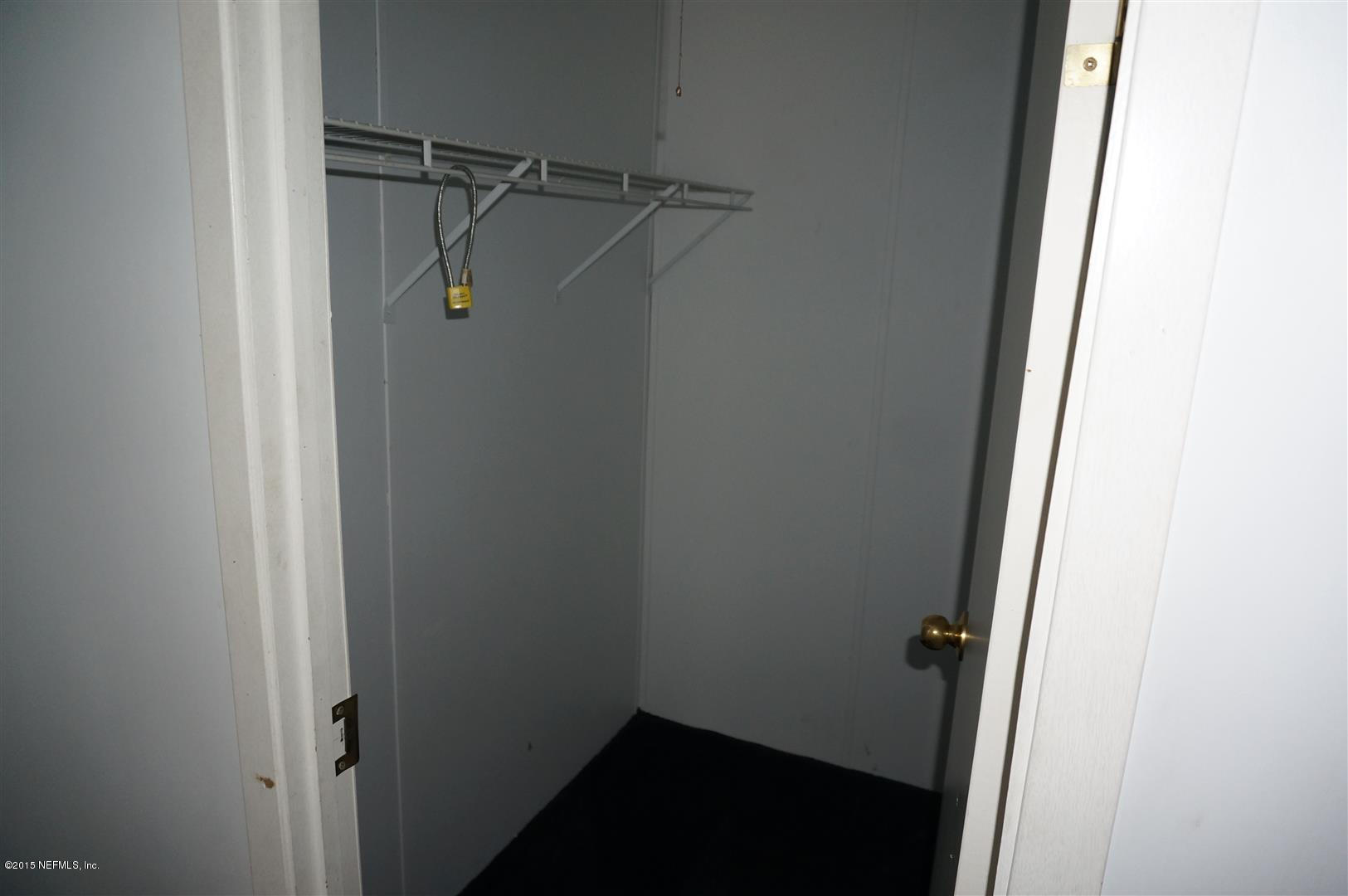 7463 Lilly Court Keystone Heights, FL 32656 - Photo 8 of 10 a view of a walk in closet