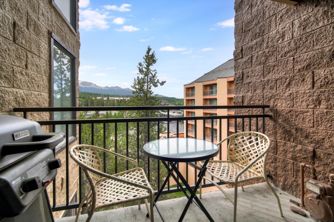 745 Columbine Road, Unit A404 Breckenridge, CO 80424 - Photo 11 of 32 a view of a chairs and table in the balcony