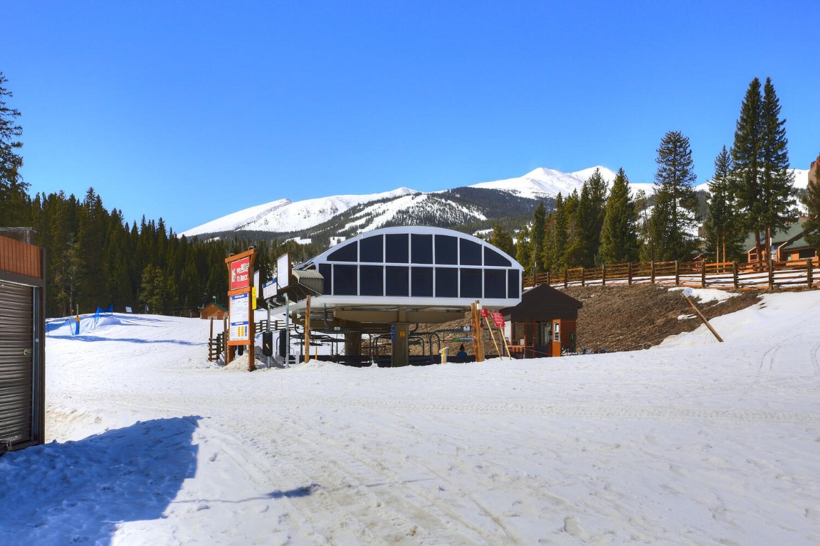 745 Columbine Road, Unit A404 Breckenridge, CO 80424 - Photo 21 of 32 a view of a house with a snow in the yard
