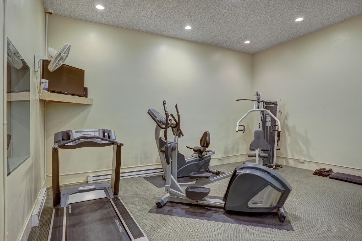 745 Columbine Road, Unit A404 Breckenridge, CO 80424 - Photo 23 of 32 a room with gym equipment