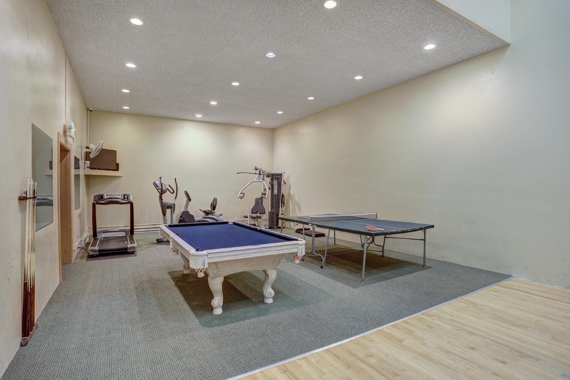 745 Columbine Road, Unit A404 Breckenridge, CO 80424 - Photo 24 of 32 a room with furniture and a rug