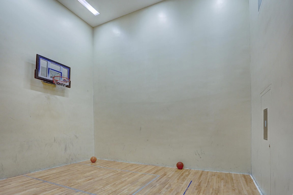 745 Columbine Road, Unit A404 Breckenridge, CO 80424 - Photo 25 of 32 a view of a room with wooden floor and bench