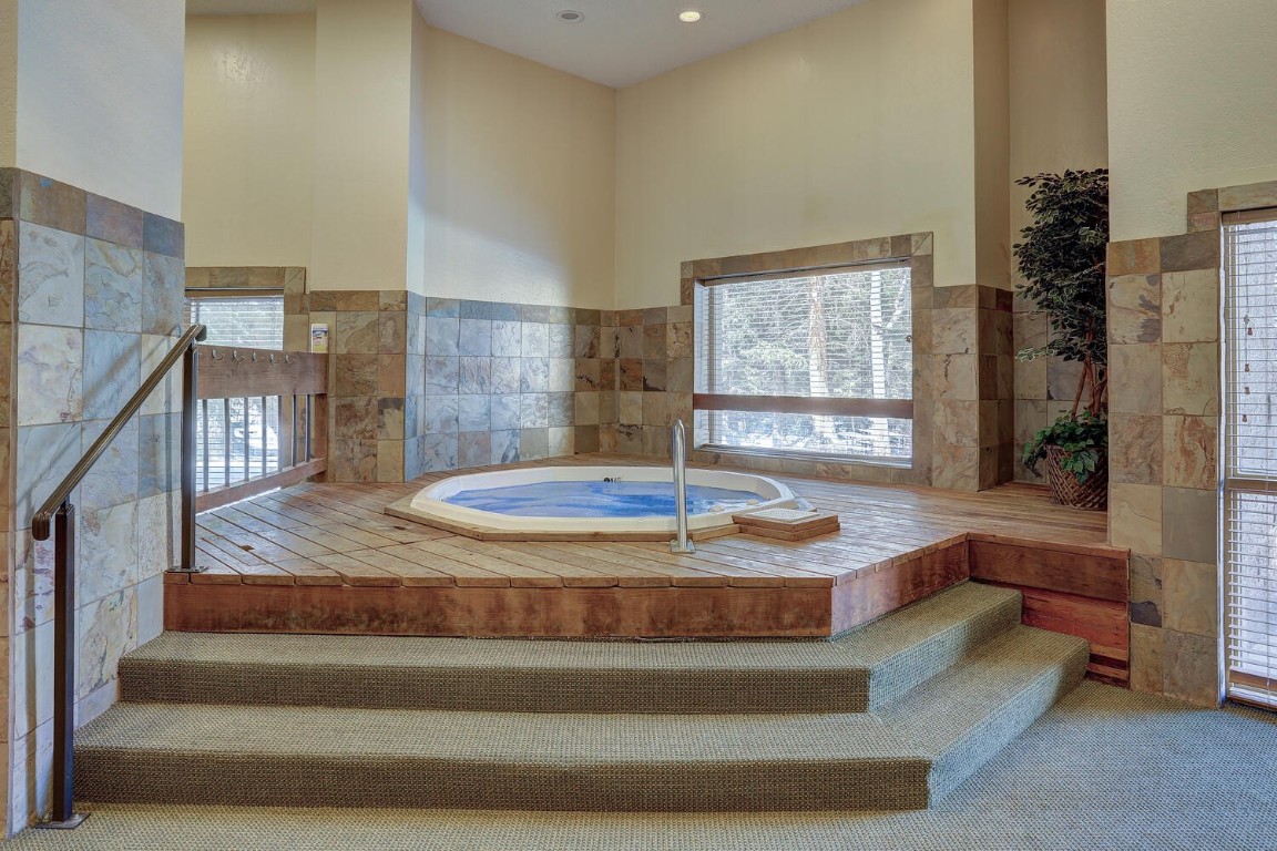 745 Columbine Road, Unit A404 Breckenridge, CO 80424 - Photo 27 of 32 a living room with couch and a rug