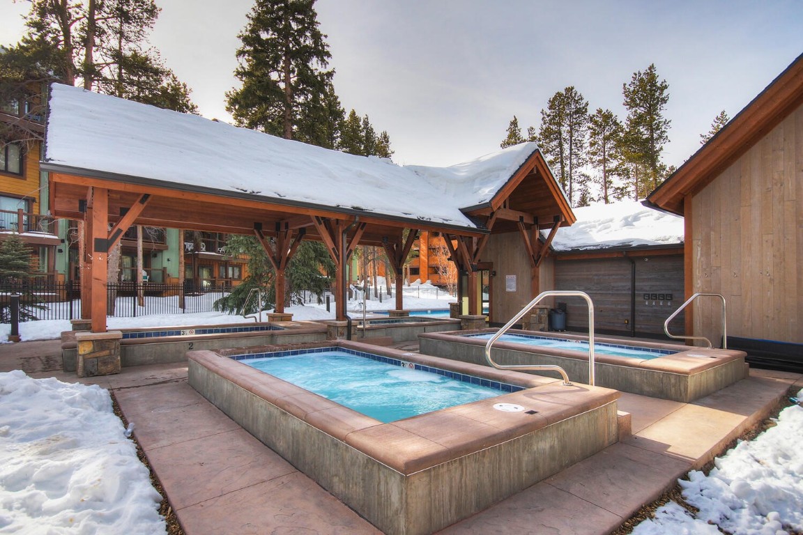 745 Columbine Road, Unit A404 Breckenridge, CO 80424 - Photo 28 of 32 a view of a house with backyard porch and sitting area