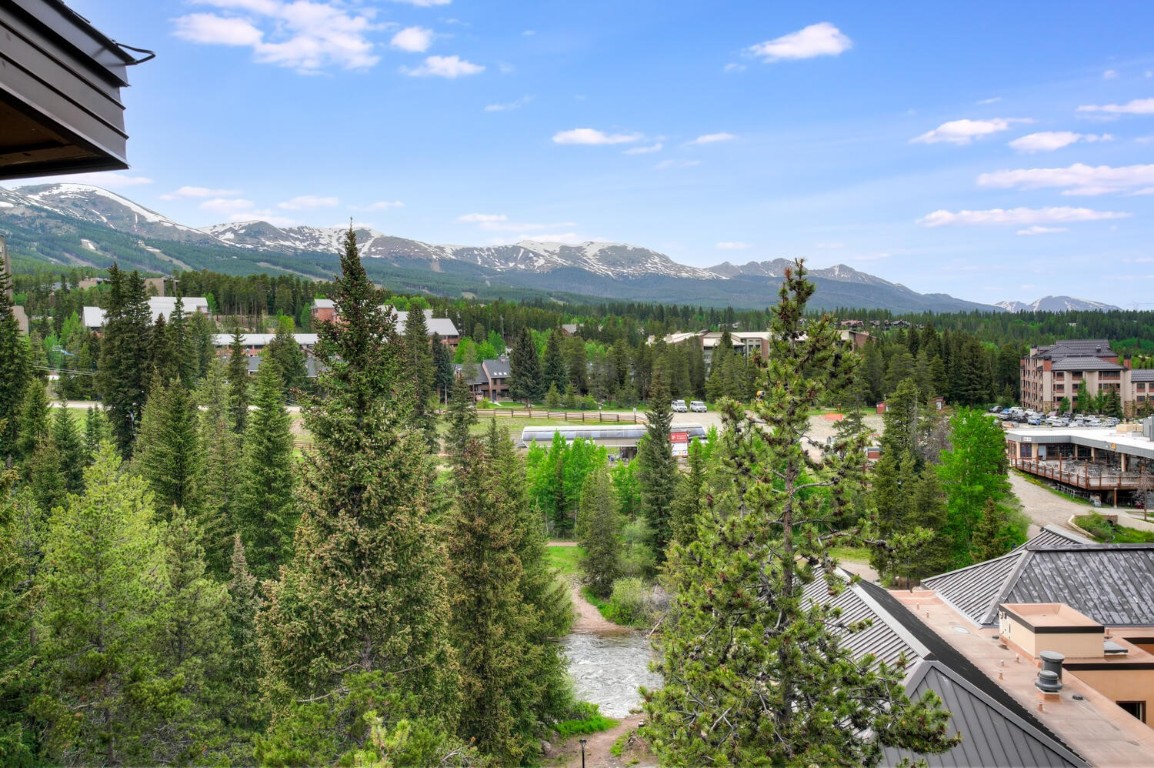 745 Columbine Road, Unit A404 Breckenridge, CO 80424 - Photo 3 of 32 a view of a lake from a balcony
