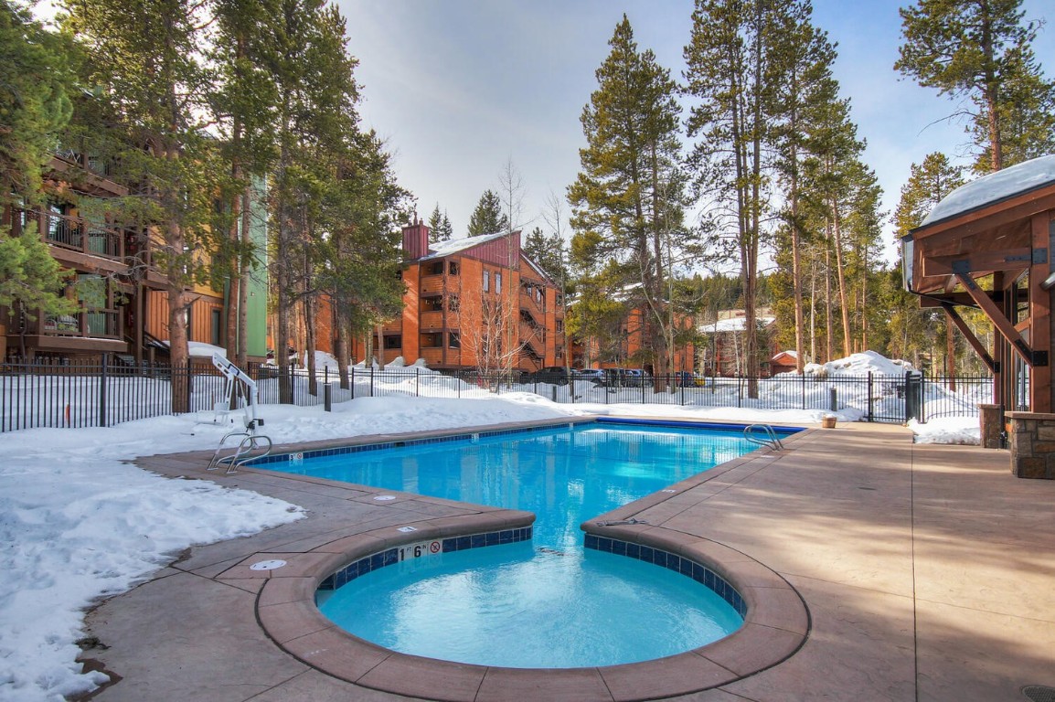 745 Columbine Road, Unit A404 Breckenridge, CO 80424 - Photo 5 of 32 a view of a swimming pool with sitting area