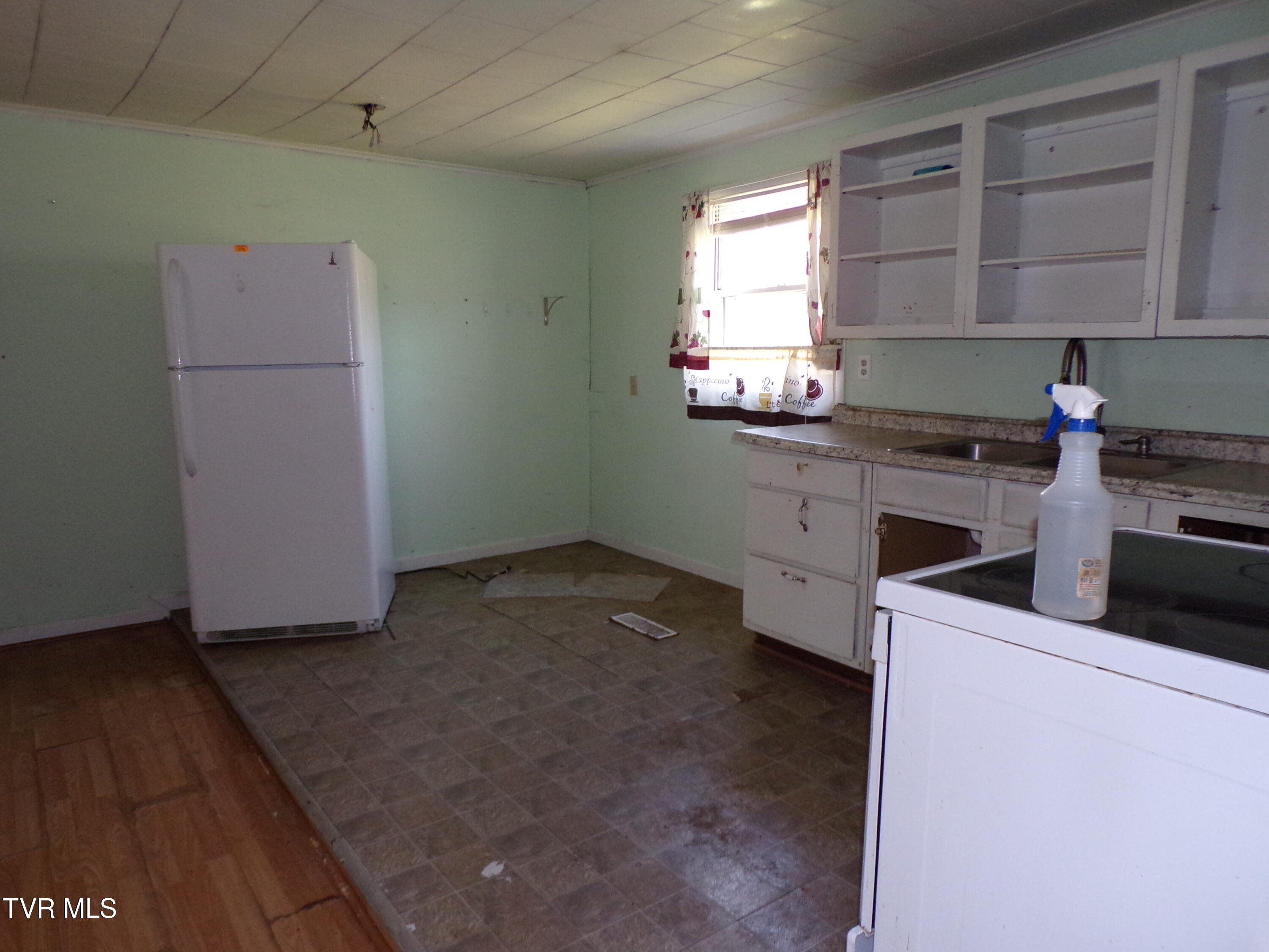 200 Rte 645 Jonesville, VA 24263 - Photo 21 of 28 KITCHEN FROM HALLWAY