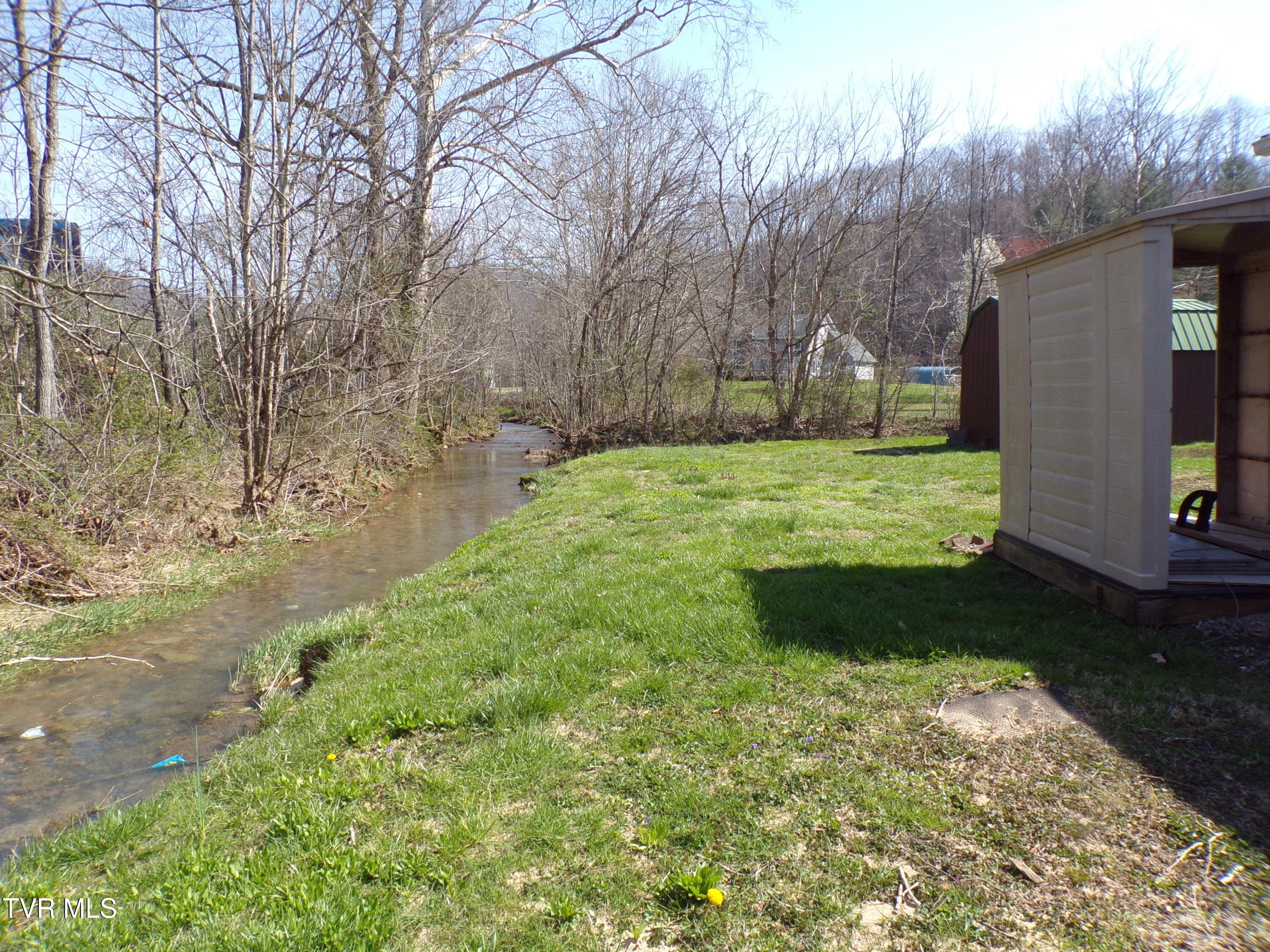200 Rte 645 Jonesville, VA 24263 - Photo 6 of 28 BACK YARD WITH STREAM