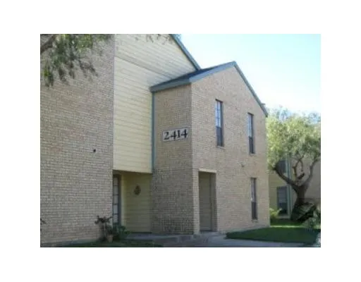 a black and white photo of a house