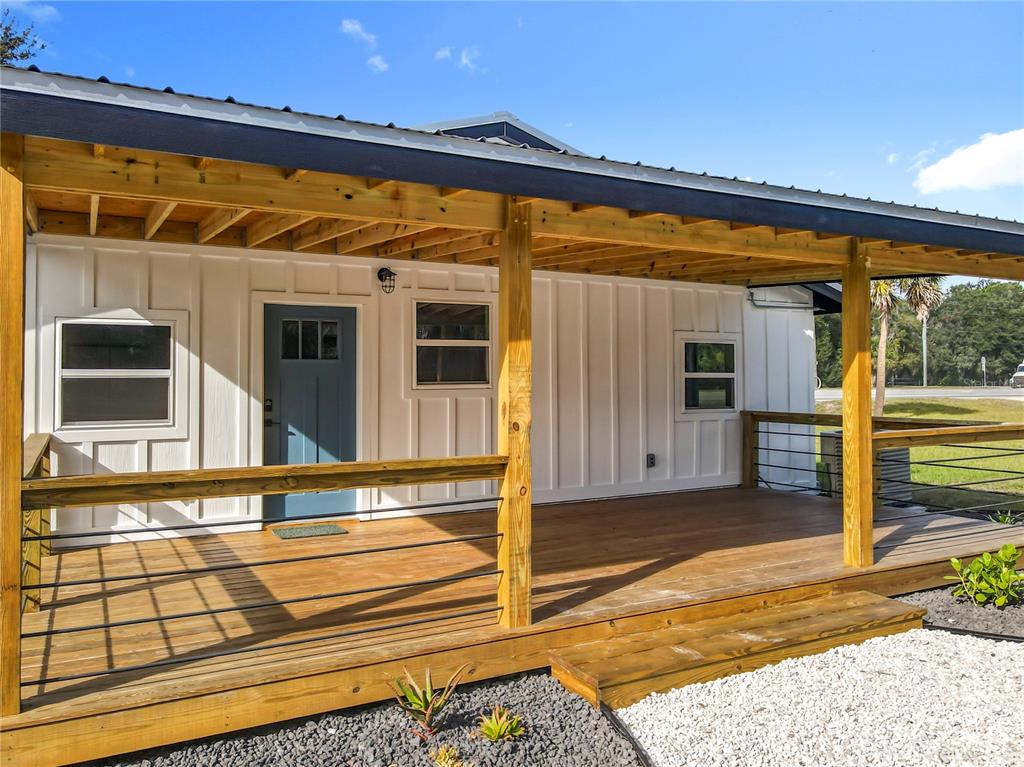 379 State Rte 415 Osteen, FL 32764 - Photo 13 of 48 a view of a building with a door