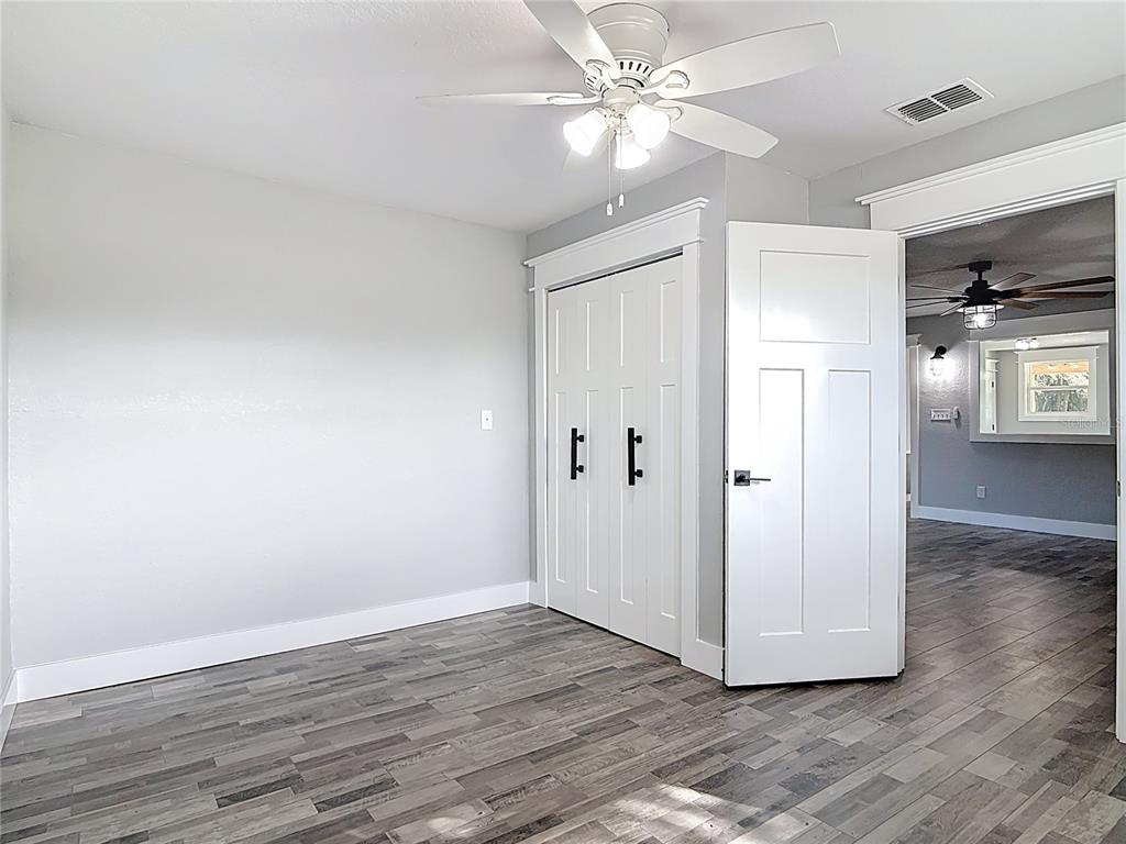 379 State Rte 415 Osteen, FL 32764 - Photo 38 of 48 a view of a room with wooden floor
