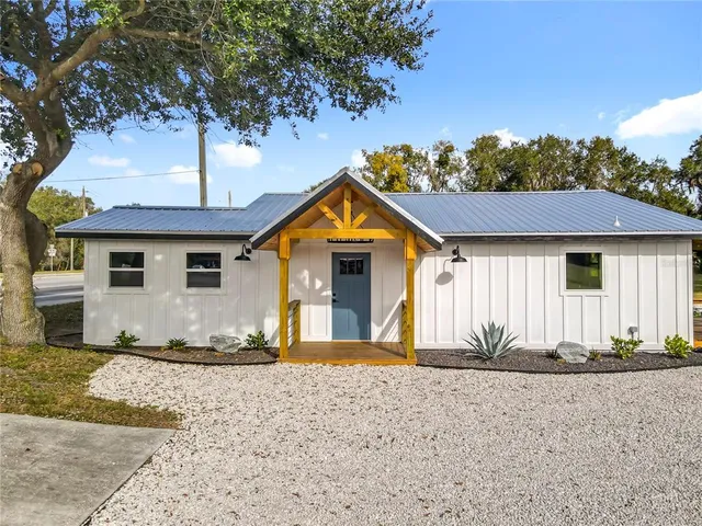 a view of a swimming pool with a yard