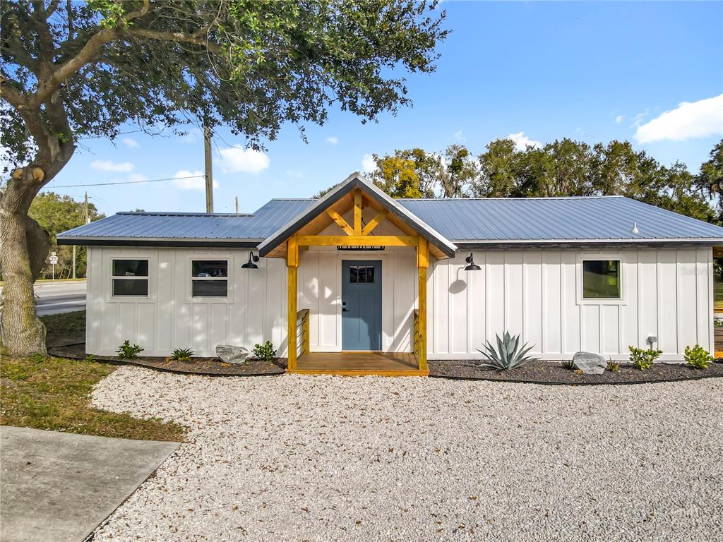 379 State Rte 415 Osteen, FL 32764 - Photo 42 of 48 a front view of a house with a yard