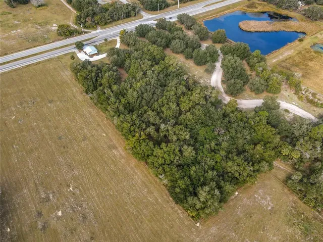 a view of a swimming pool from a balcony