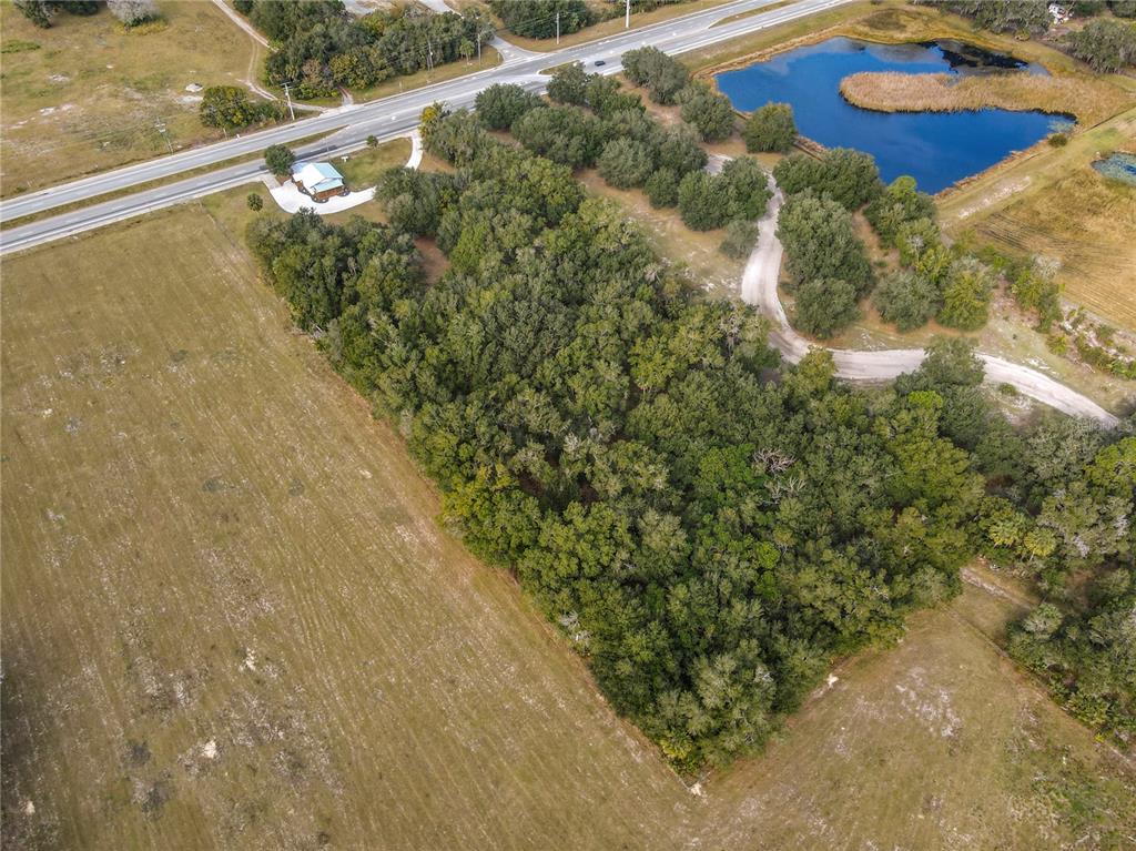 379 State Rte 415 Osteen, FL 32764 - Photo 9 of 48 a view of a swimming pool from a balcony