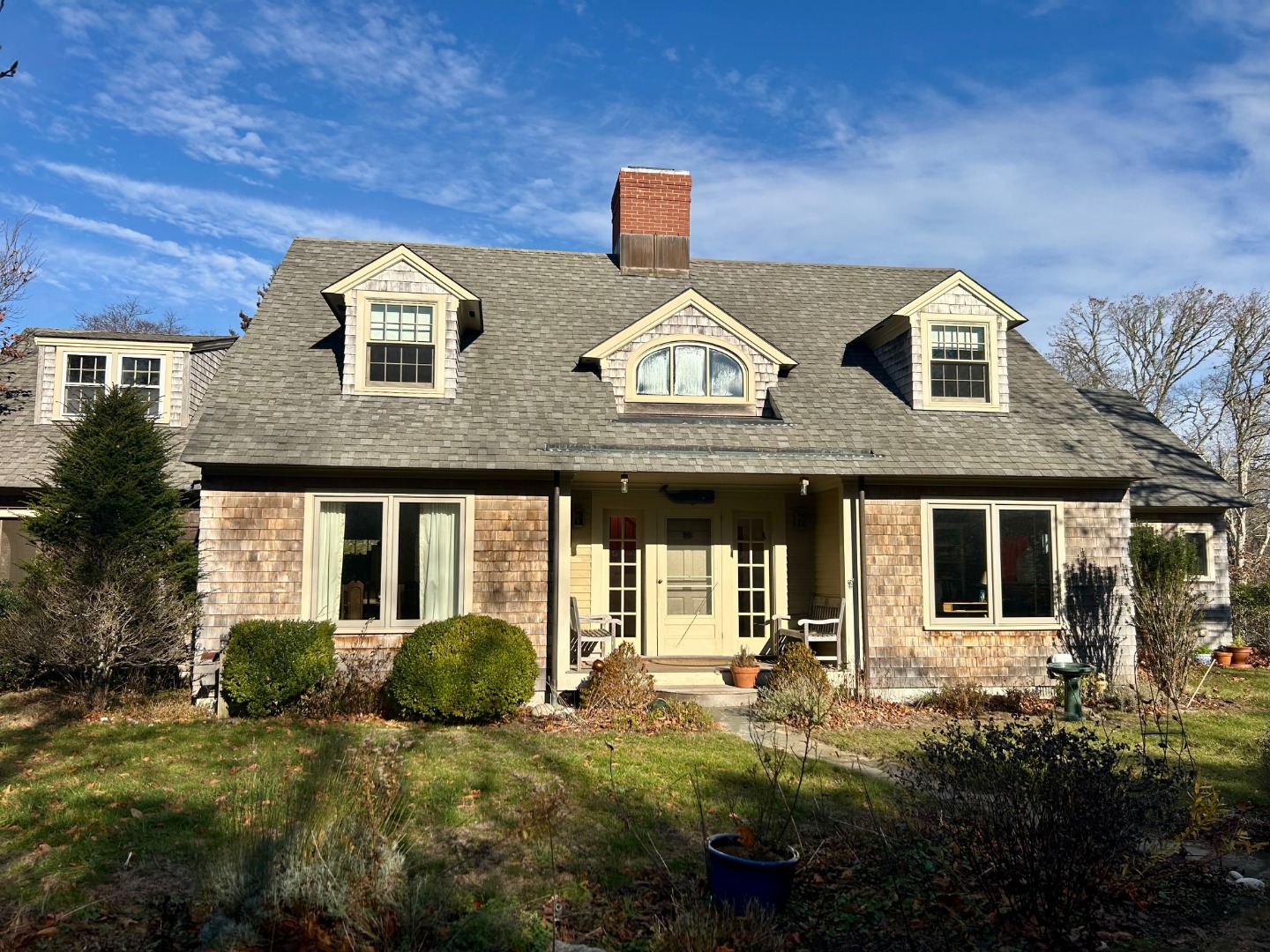 209 Chappaquiddick Road Edgartown, MA 02539 - Photo 2 of 7 a front view of a house with a yard