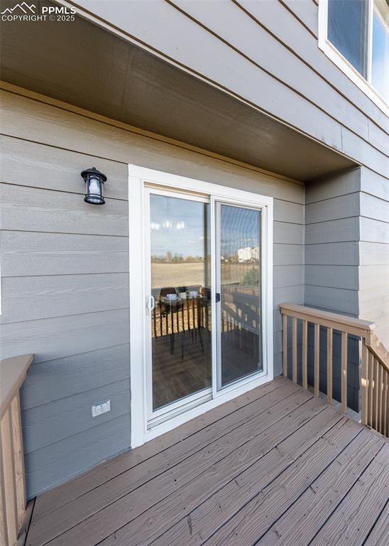 7715 Old Spec Road Peyton, CO 80831 - Photo 13 of 50 a view of wooden balcony
