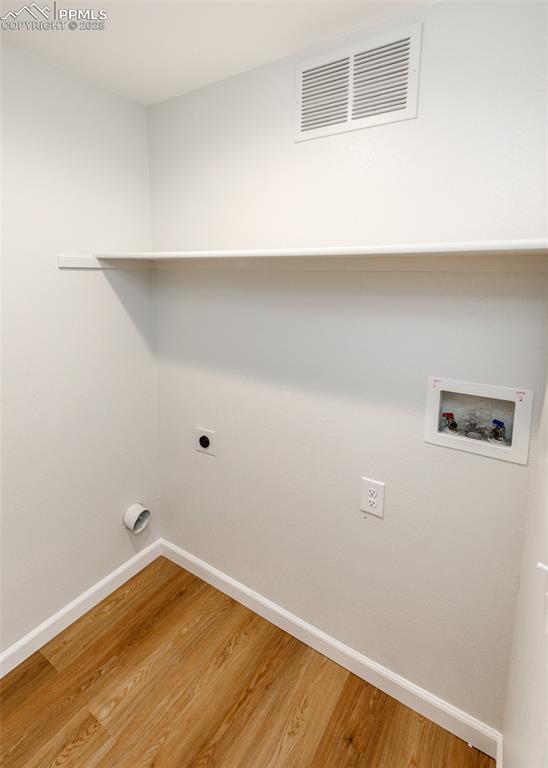 7715 Old Spec Road Peyton, CO 80831 - Photo 24 of 50 a view of a room with wooden floor