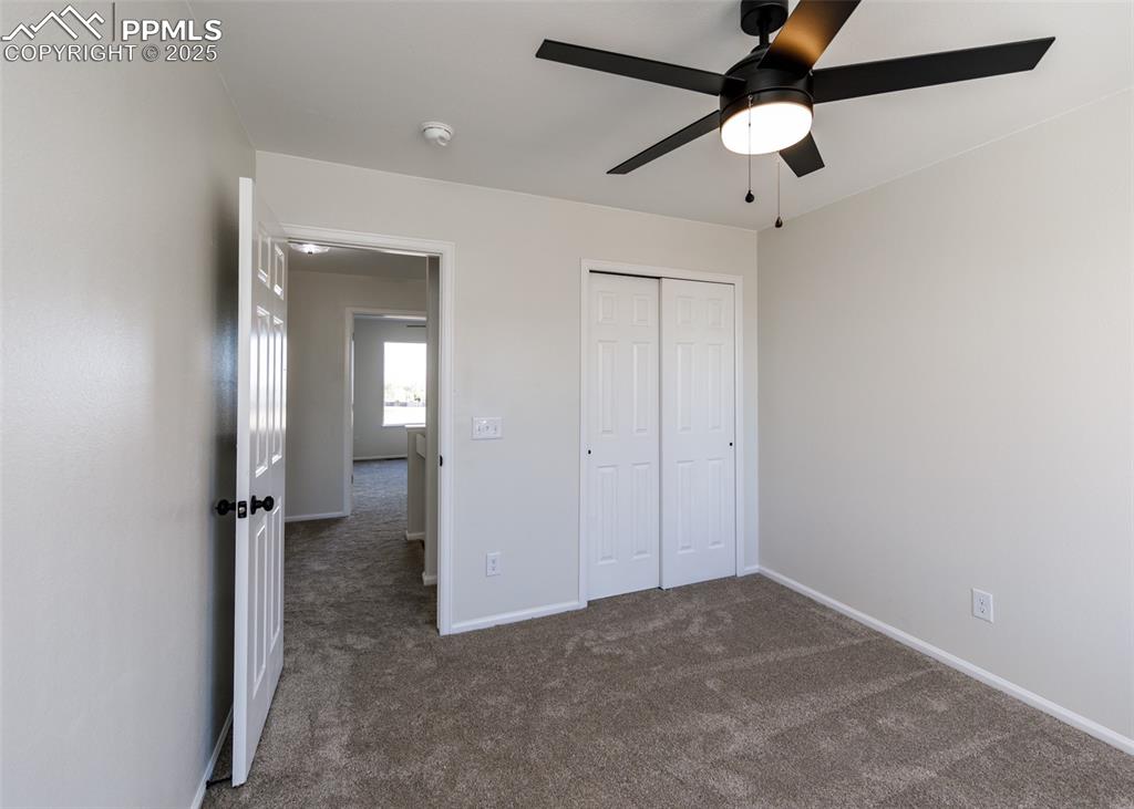 7715 Old Spec Road Peyton, CO 80831 - Photo 34 of 50 wooden floor in an empty room