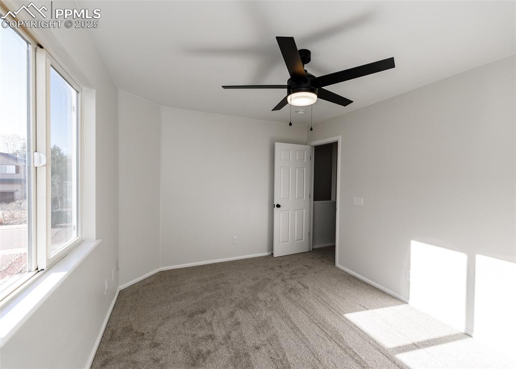 7715 Old Spec Road Peyton, CO 80831 - Photo 36 of 50 a view of an empty room and window