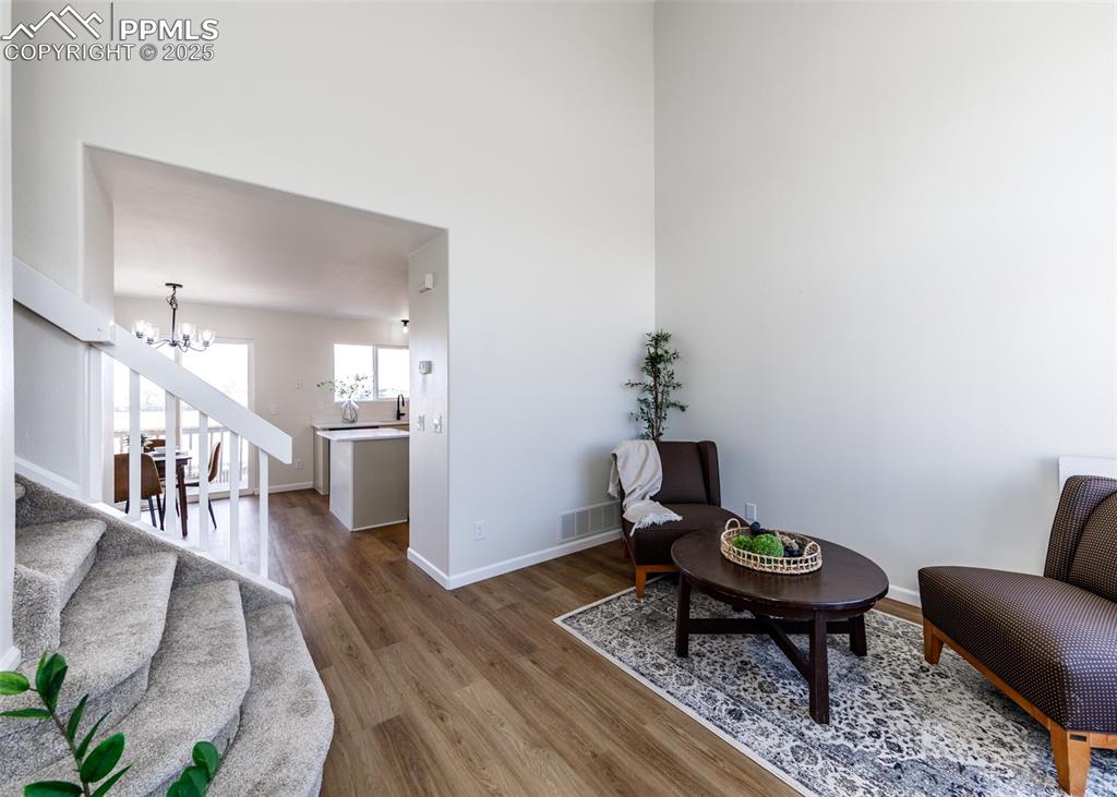 7715 Old Spec Road Peyton, CO 80831 - Photo 4 of 50 a living room with furniture and wooden floor