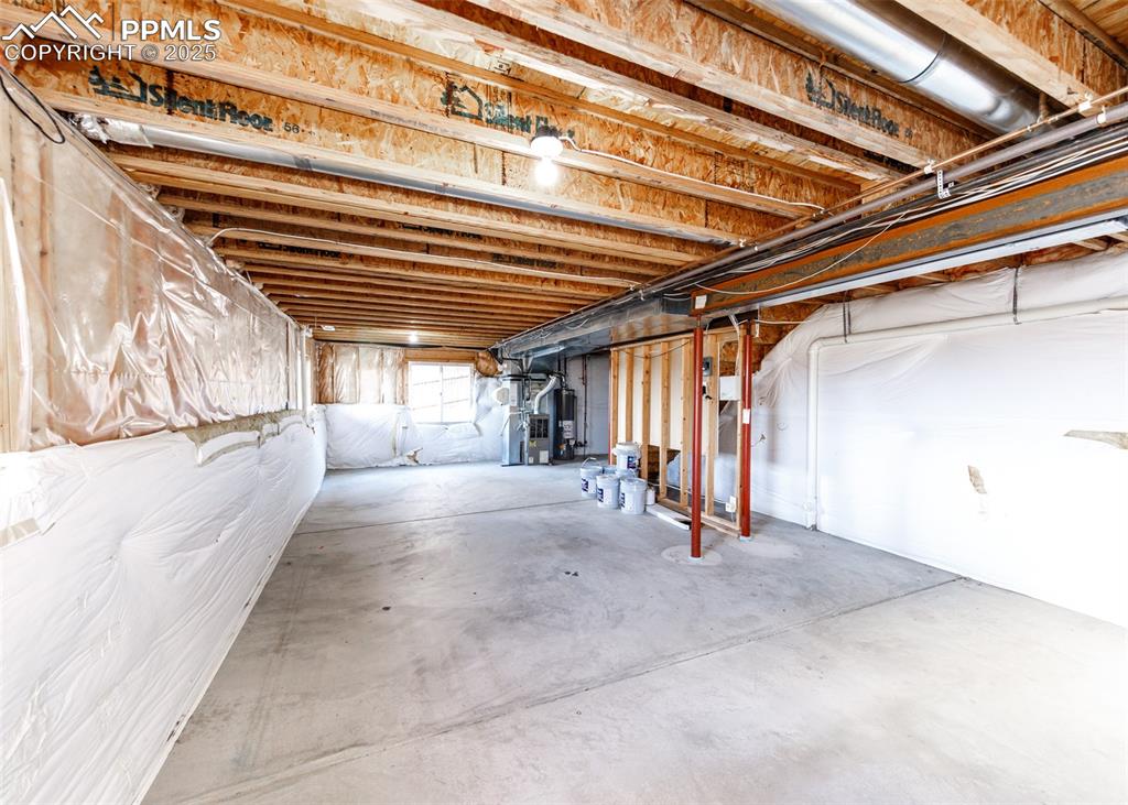 7715 Old Spec Road Peyton, CO 80831 - Photo 43 of 50 a view of a room with wooden floor and windows