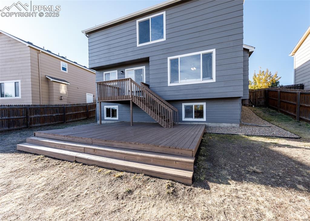 7715 Old Spec Road Peyton, CO 80831 - Photo 44 of 50 a front view of a house with a yard