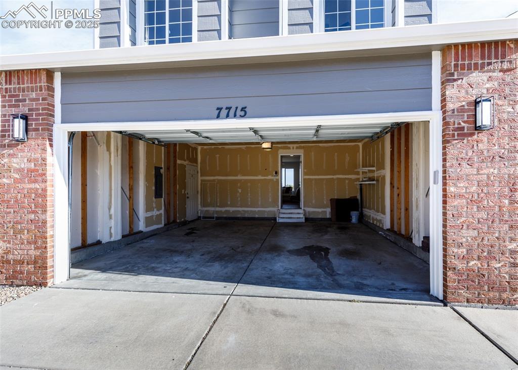 7715 Old Spec Road Peyton, CO 80831 - Photo 48 of 50 a view of a car garage of the house