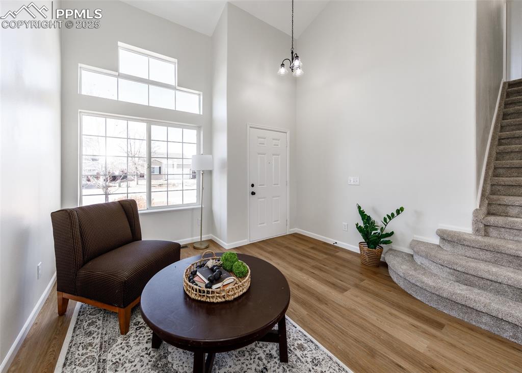 7715 Old Spec Road Peyton, CO 80831 - Photo 5 of 50 a living room with furniture and a wooden floor