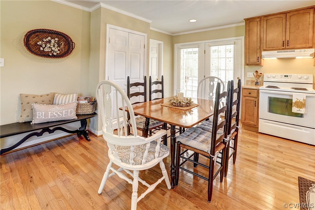16381 Genito Road Moseley, VA 23120 - Photo 11 of 39 a view of a dining room with furniture window and wooden floor