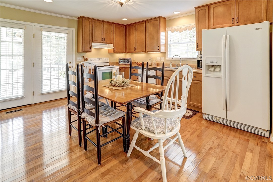 16381 Genito Road Moseley, VA 23120 - Photo 12 of 39 a view of a dining room with furniture window and wooden floor