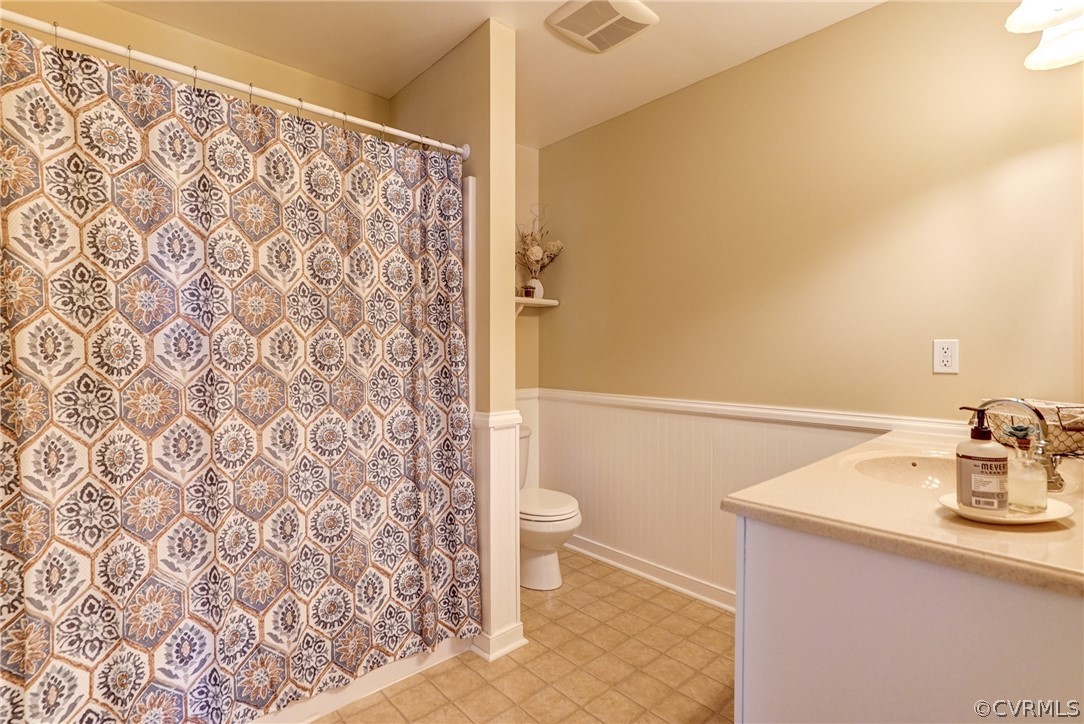 16381 Genito Road Moseley, VA 23120 - Photo 18 of 39 a bathroom with a sink and a toilet