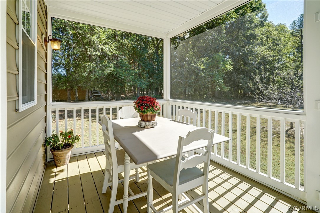 16381 Genito Road Moseley, VA 23120 - Photo 22 of 39 a view of a two chairs and table in patio