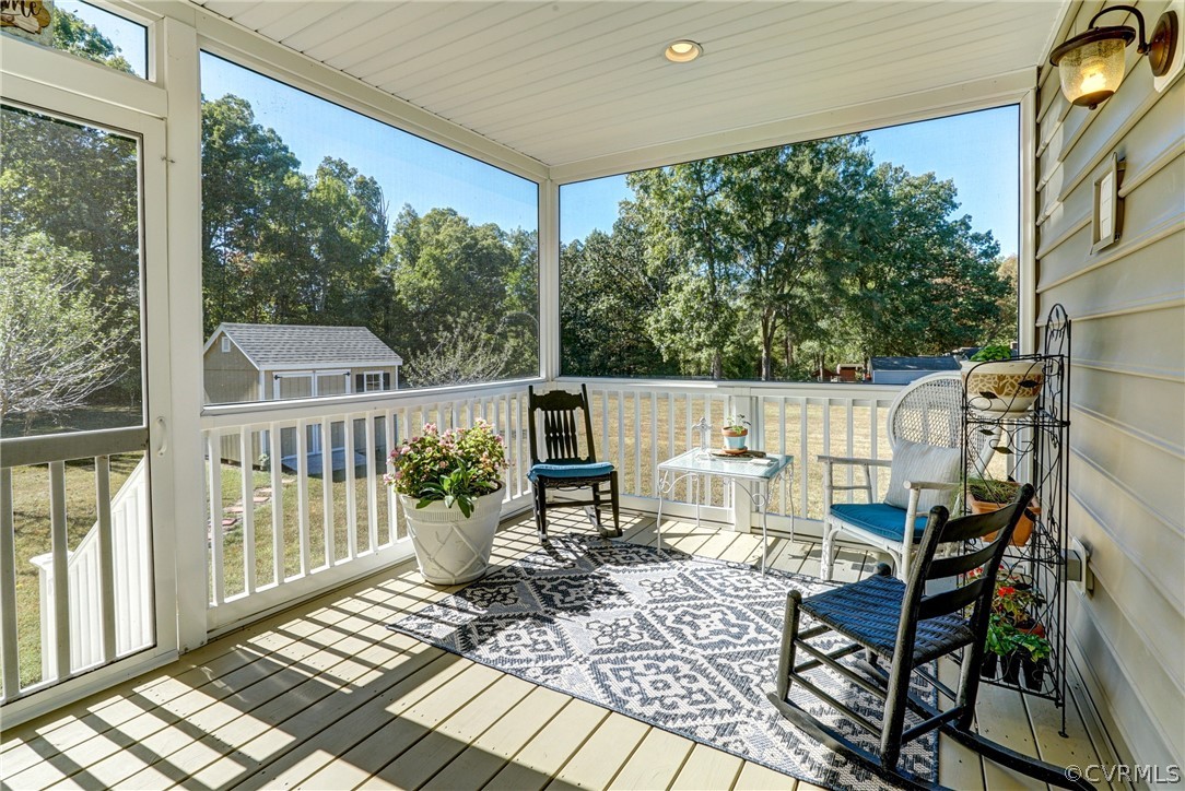 16381 Genito Road Moseley, VA 23120 - Photo 24 of 39 a view of a chairs and table in the balcony