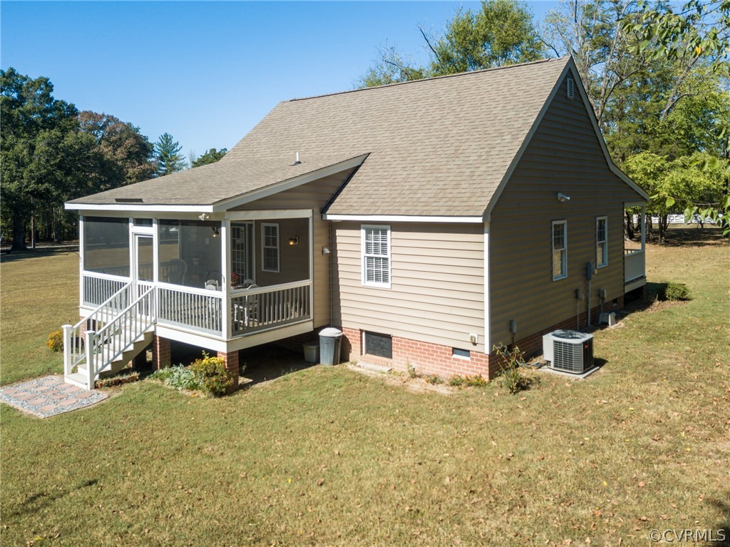 16381 Genito Road Moseley, VA 23120 - Photo 25 of 39 a front view of a house with a yard