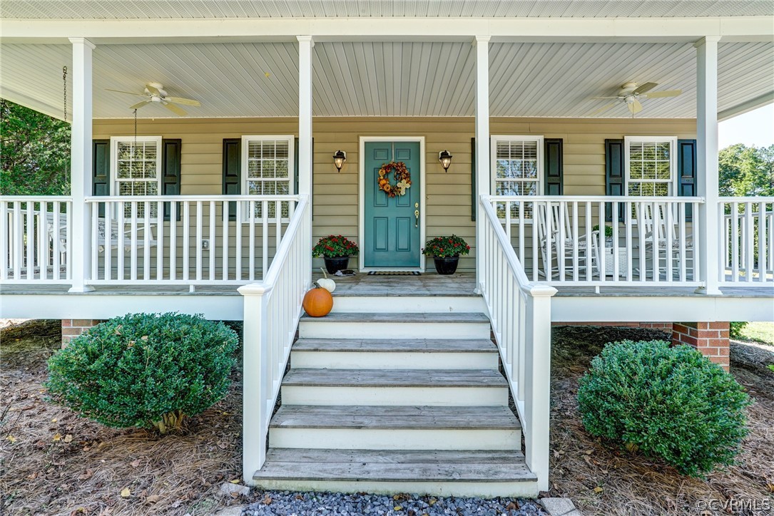 16381 Genito Road Moseley, VA 23120 - Photo 26 of 39 a view of a house with a small yard and wooden fence