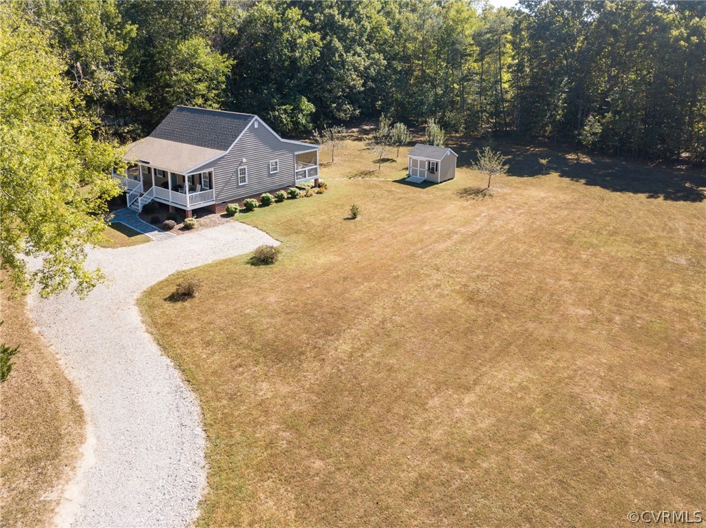 16381 Genito Road Moseley, VA 23120 - Photo 29 of 39 a view of a house with a yard covered with snow