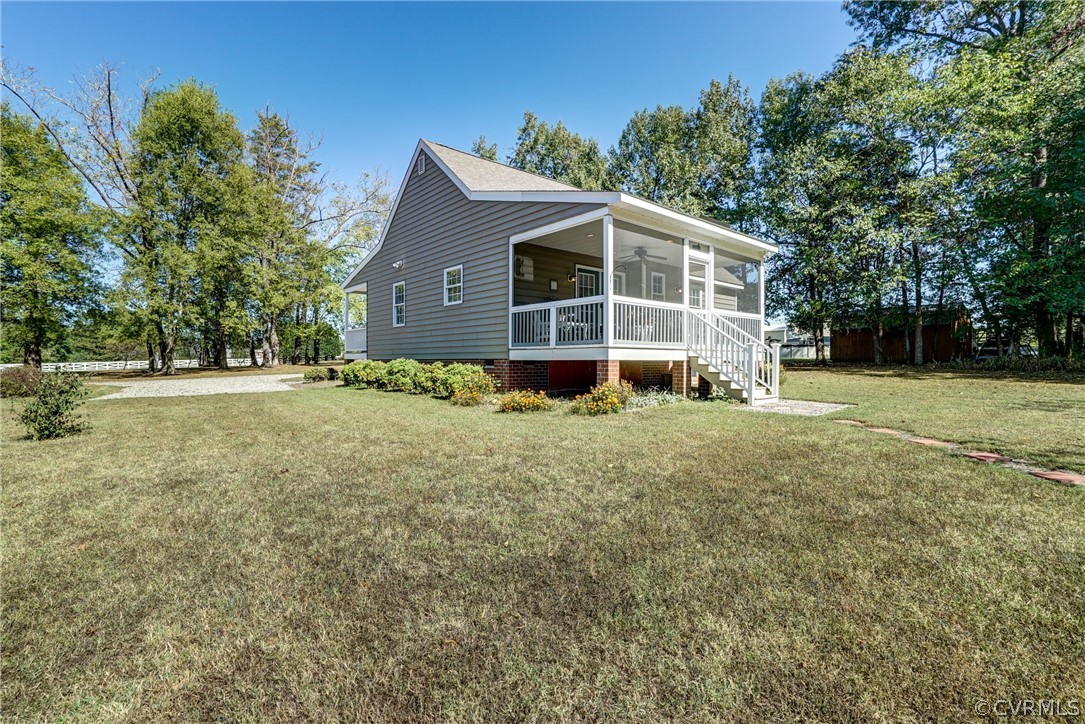 16381 Genito Road Moseley, VA 23120 - Photo 31 of 39 a view of a house with a yard