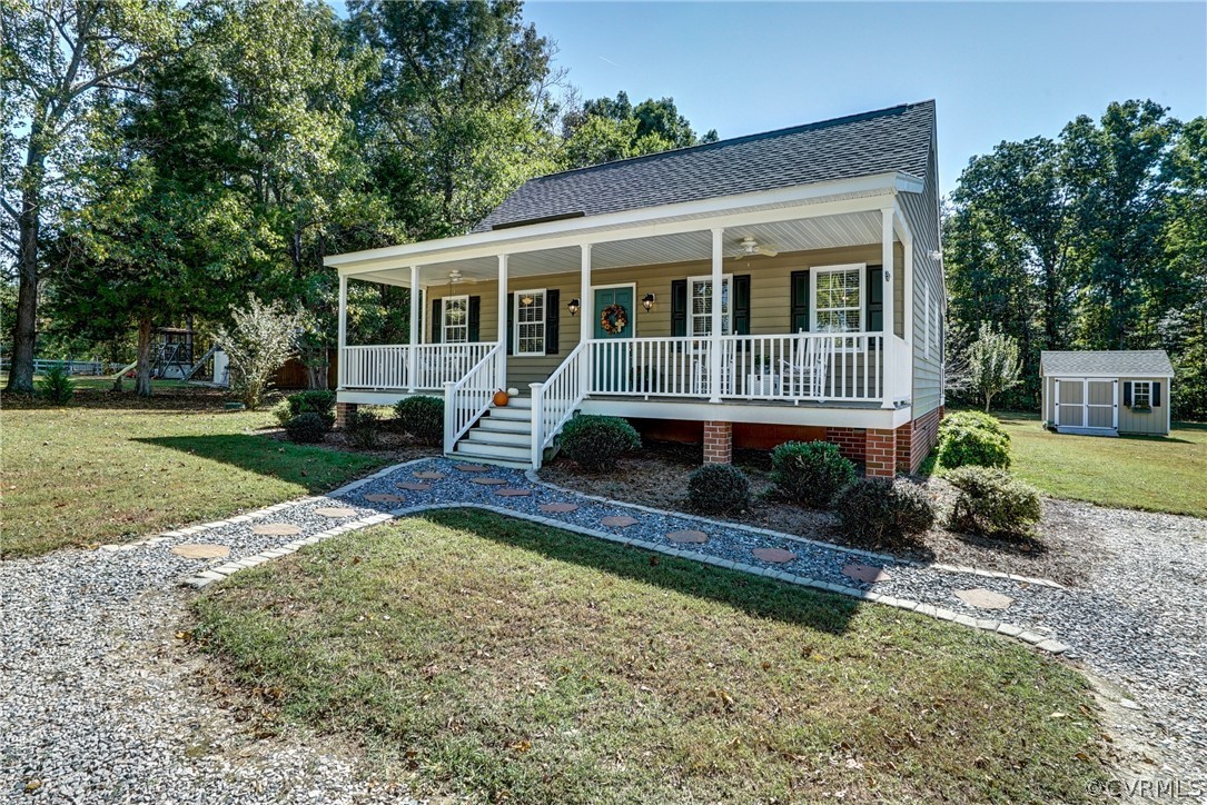 16381 Genito Road Moseley, VA 23120 - Photo 32 of 39 front view of a house with a yard