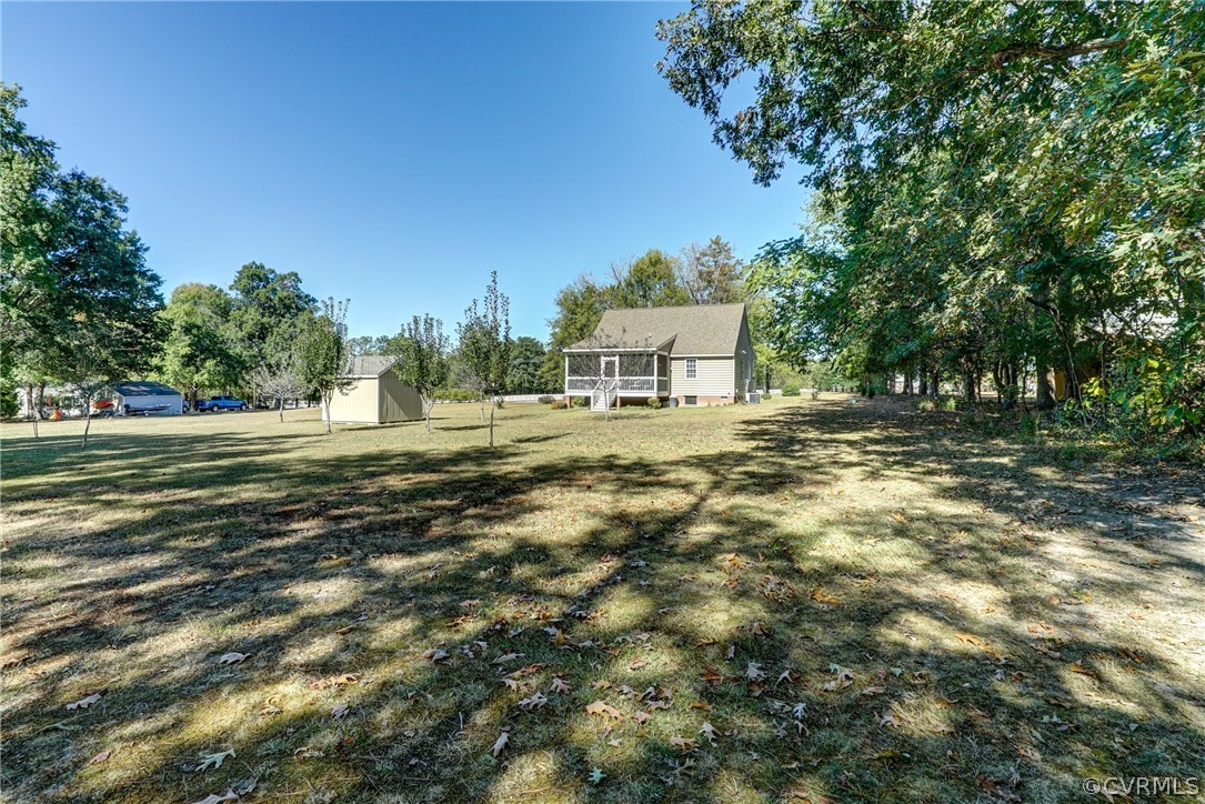16381 Genito Road Moseley, VA 23120 - Photo 35 of 39 a view of a house with a yard