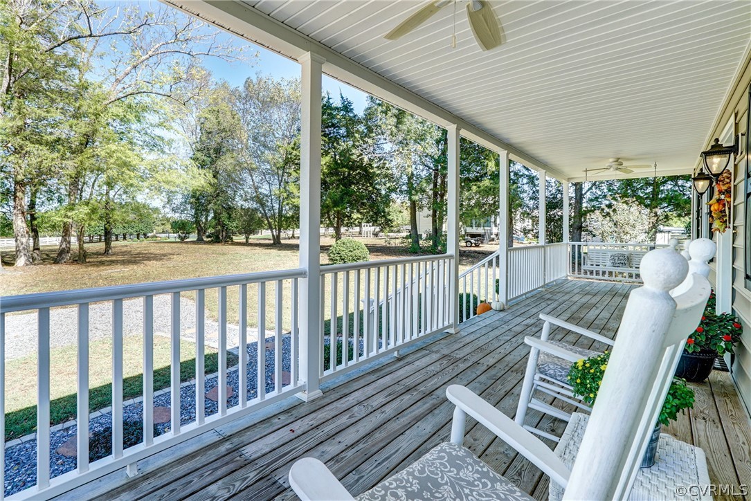 16381 Genito Road Moseley, VA 23120 - Photo 4 of 39 a view of balcony with wooden floor and outdoor seating