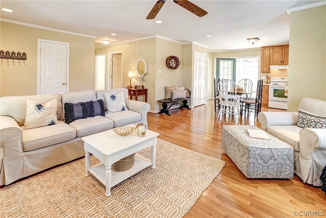 16381 Genito Road Moseley, VA 23120 - Photo 6 of 39 a living room with furniture and wooden floor
