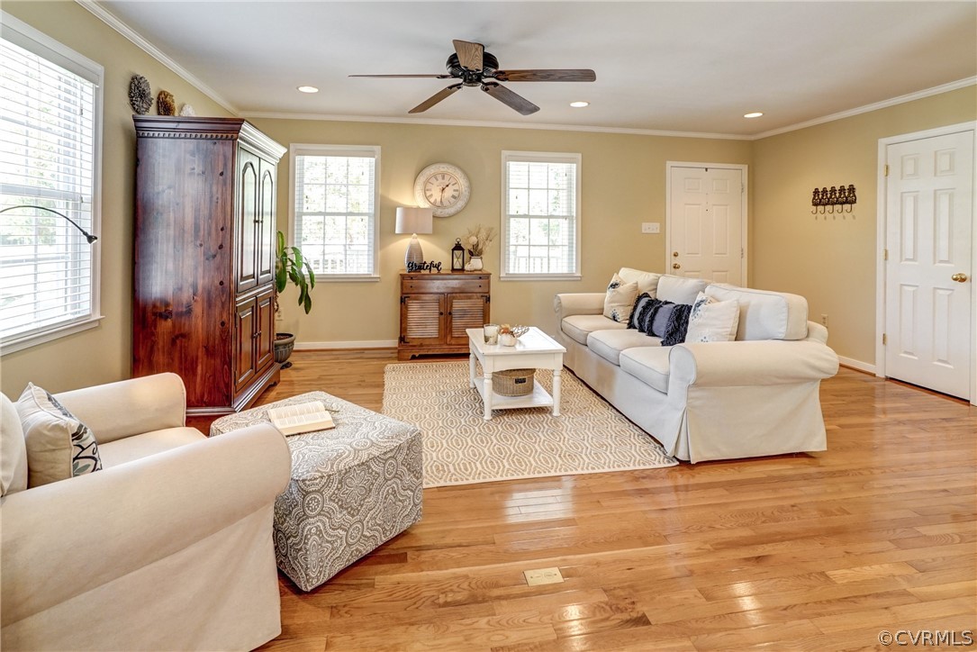 16381 Genito Road Moseley, VA 23120 - Photo 7 of 39 a living room with furniture and a large window