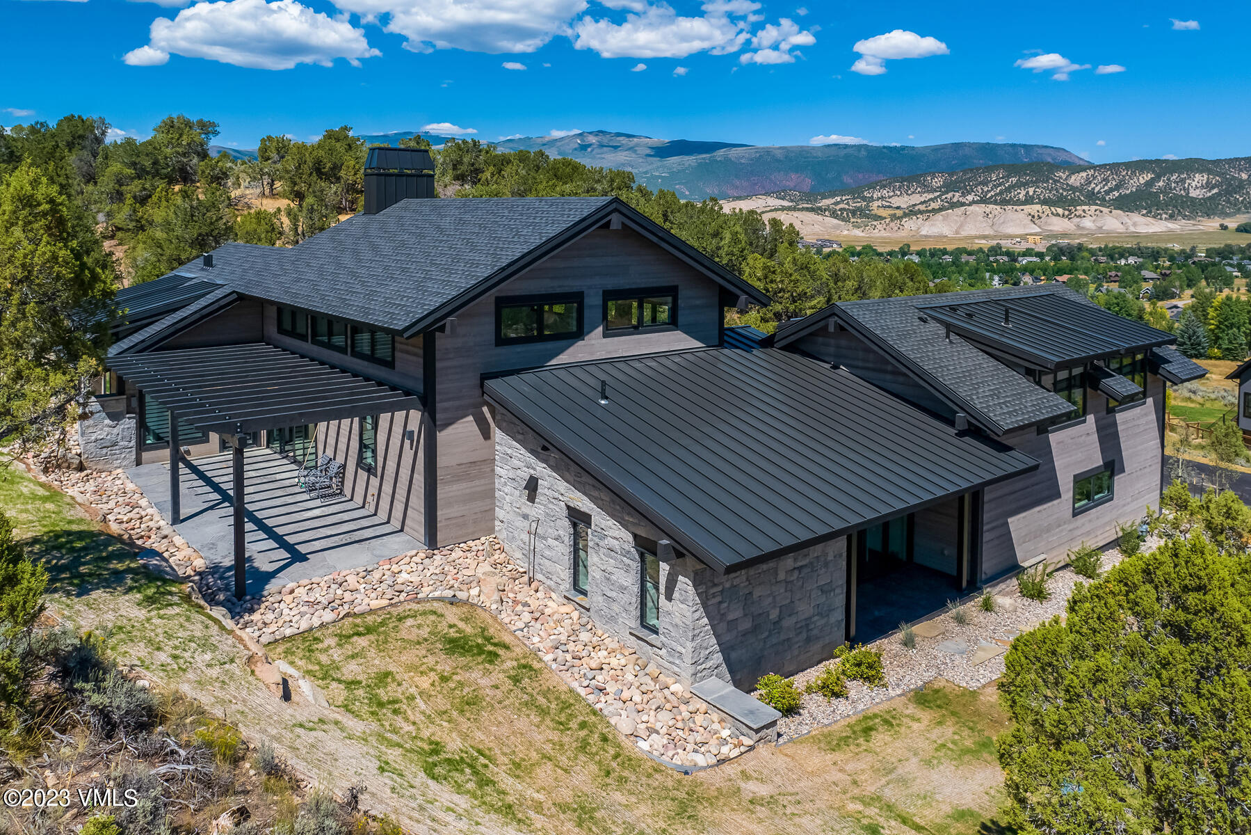 125 Silver Spur Eagle, CO 81631 - Photo 17 of 48 a view of a house with roof and wooden floor