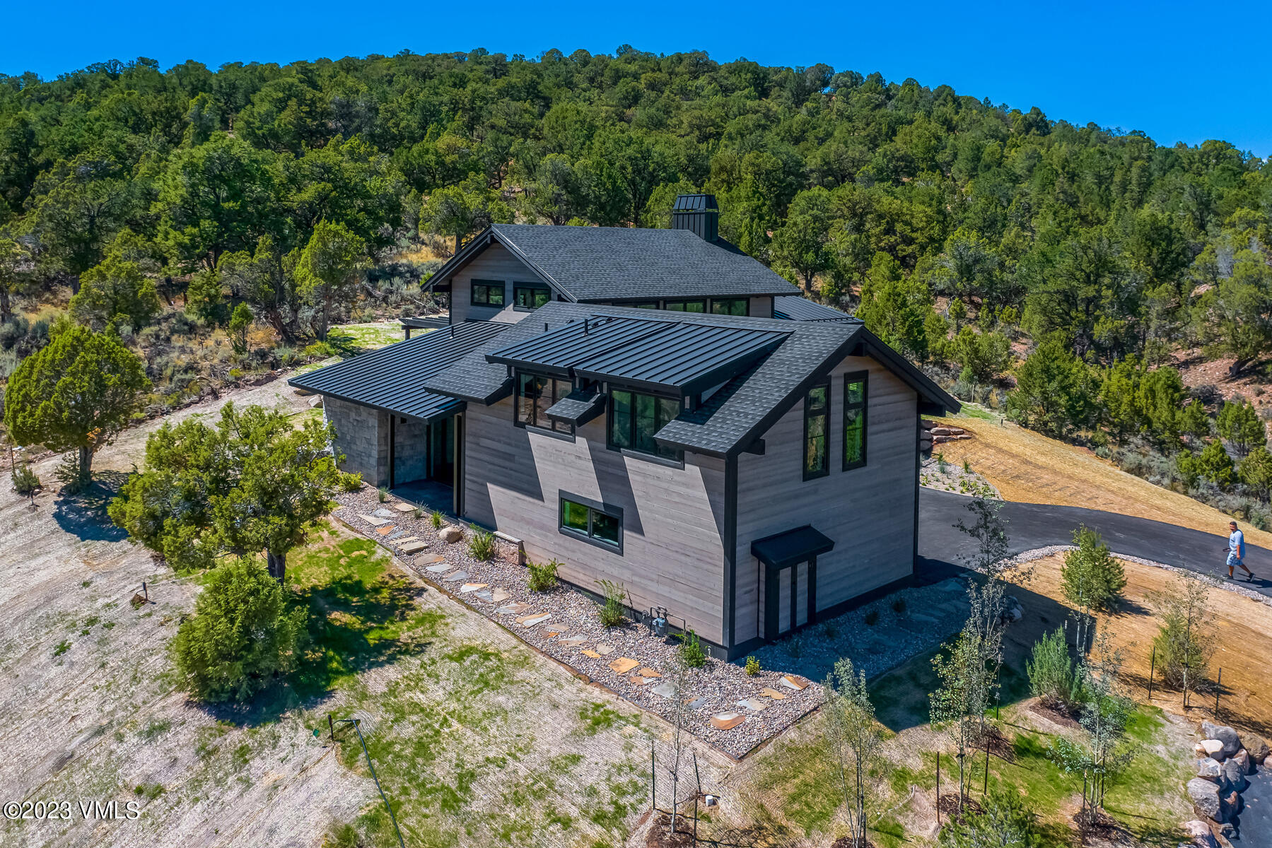 125 Silver Spur Eagle, CO 81631 - Photo 18 of 48 a view of a house with a big yard plants and large trees